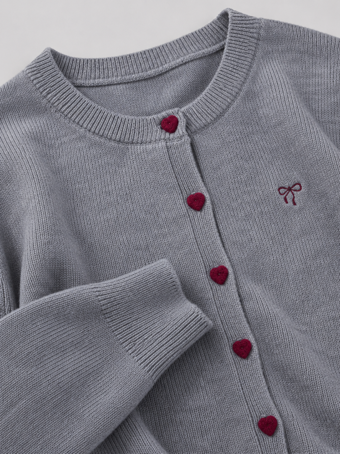 Cardigan Donna in Maglia Bottoni a Cuore e Ricamo Fiocco